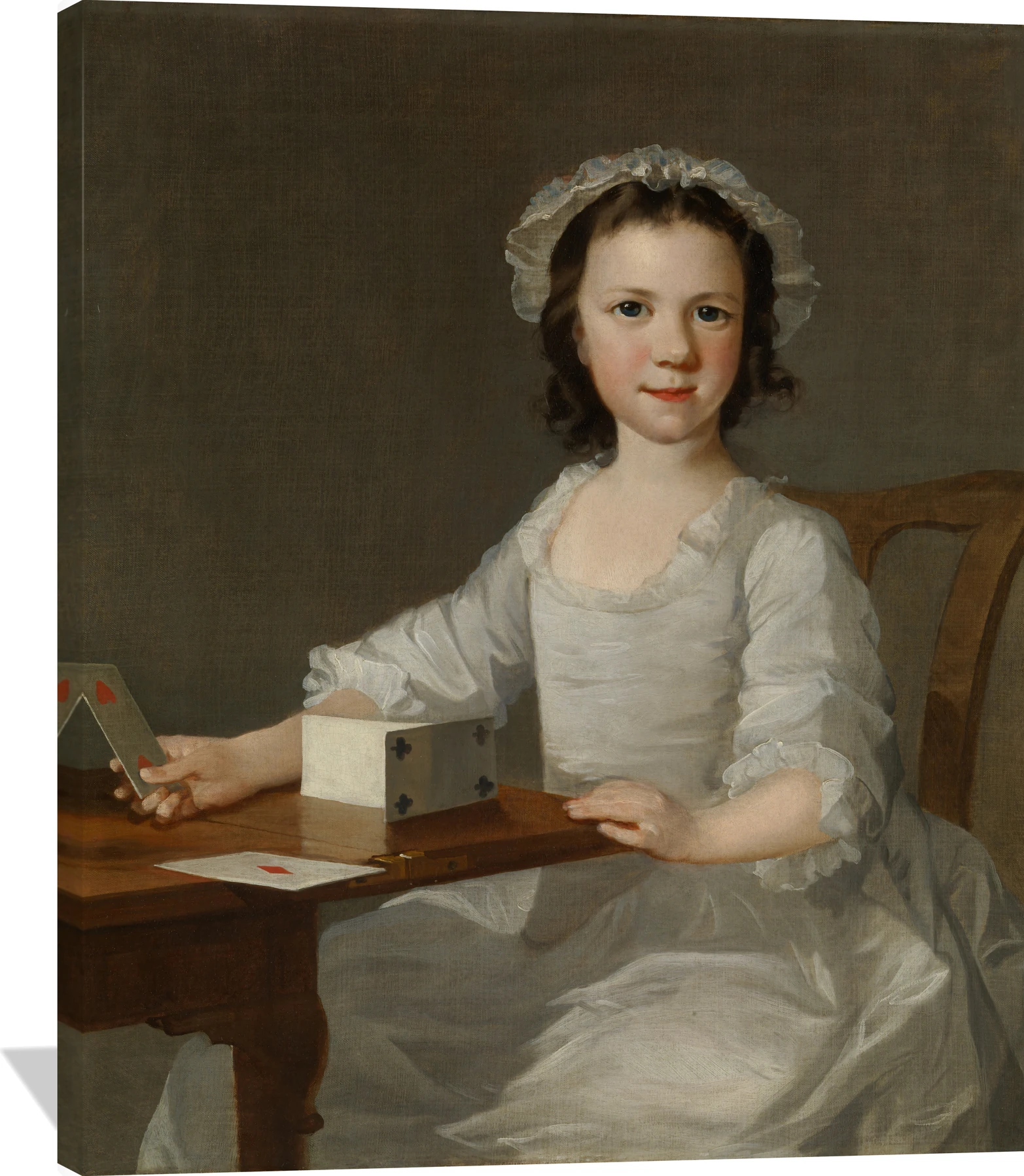 Girl Building a House of Cards